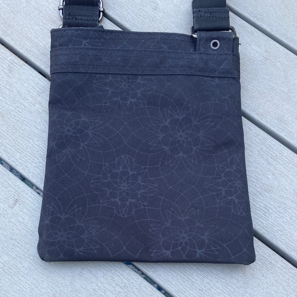 Dakine Black Crossbody Bag with Floral Accent